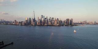 Cityscape on the water at sunrise