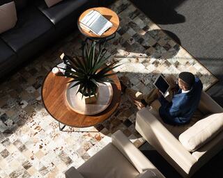 table in office with plant on it