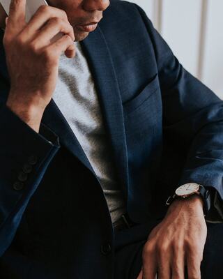 Business person in suit on the phone