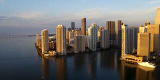 Cityscape on the water at sunrise